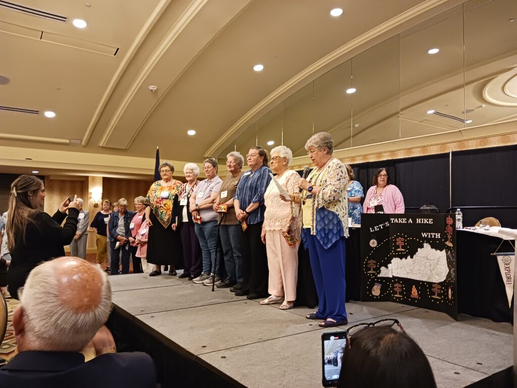 Past president Karen Hill, standing on the right, installed the KEHA officers who were elected during the 2023 KEHA State Meeting business meeting.